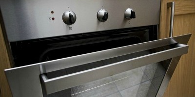 Master Technician Repairing Built-in Thermofan Oven in Pretoria Kitchen
